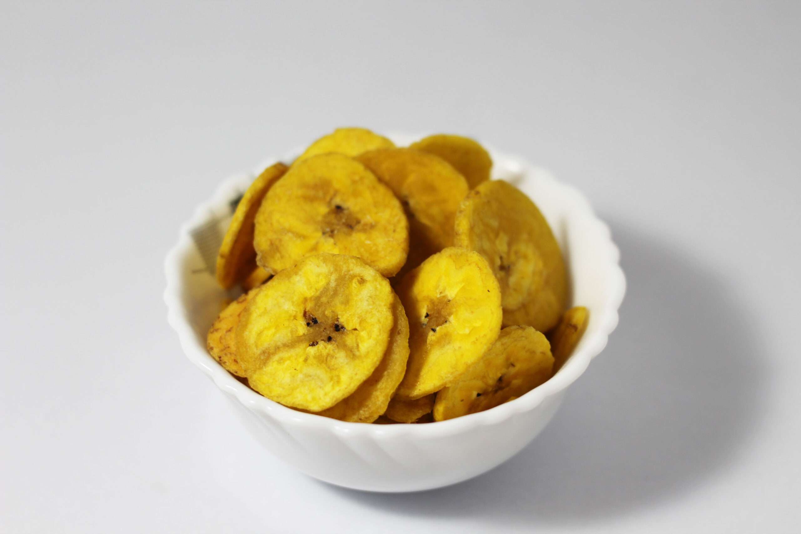 fresh-banana-chips-in-white-bowl